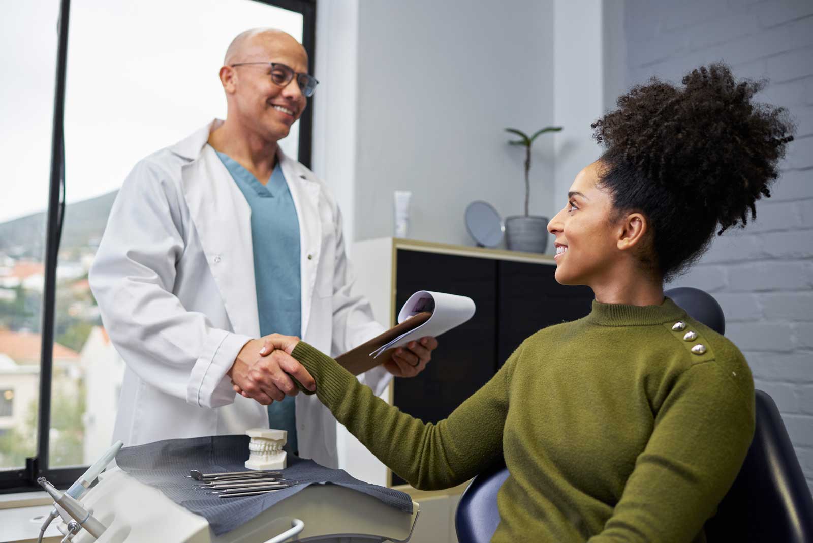 Dental Specialist with Patient